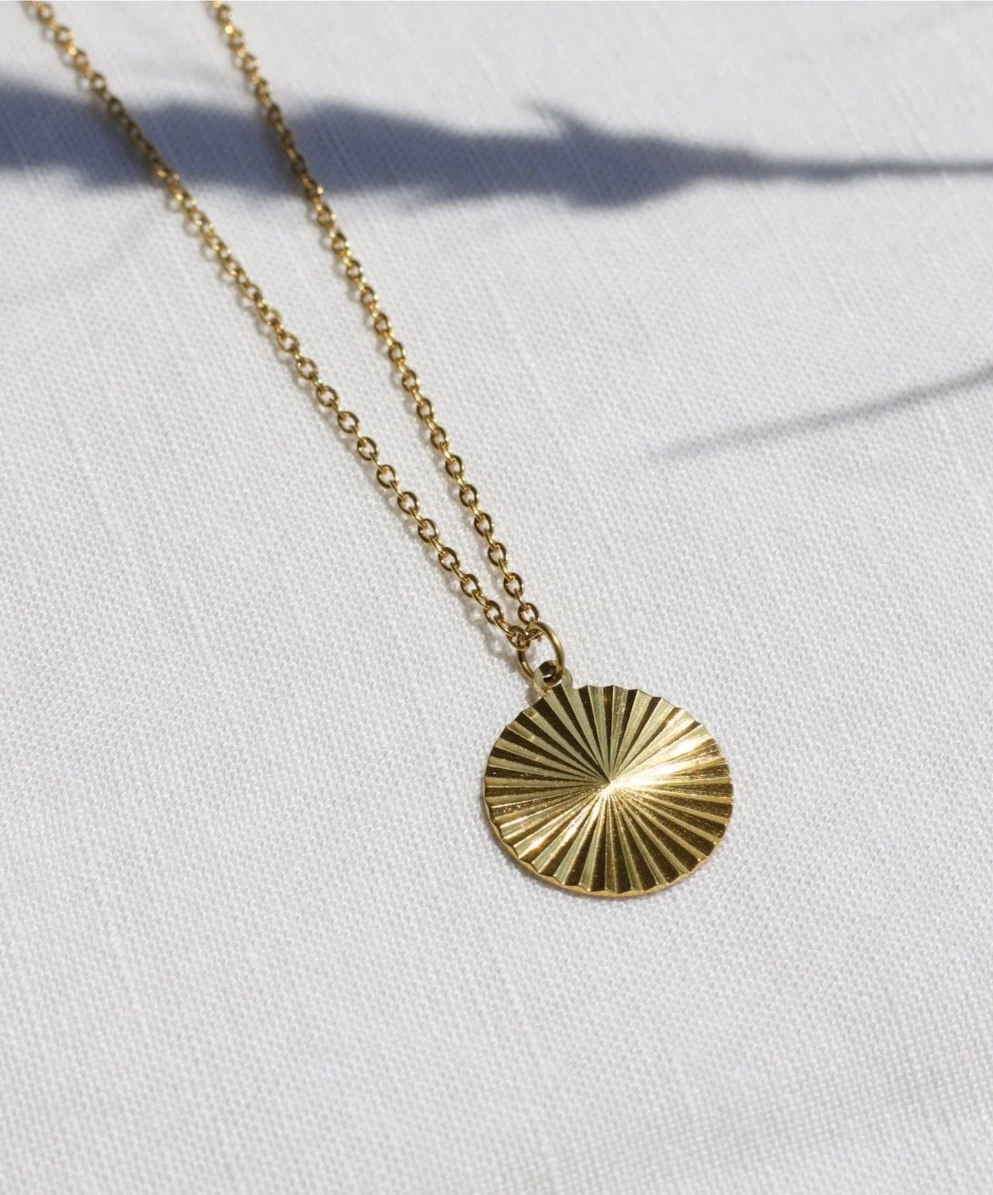 MILO SUNBURST ROUND CHARM NECKLACE