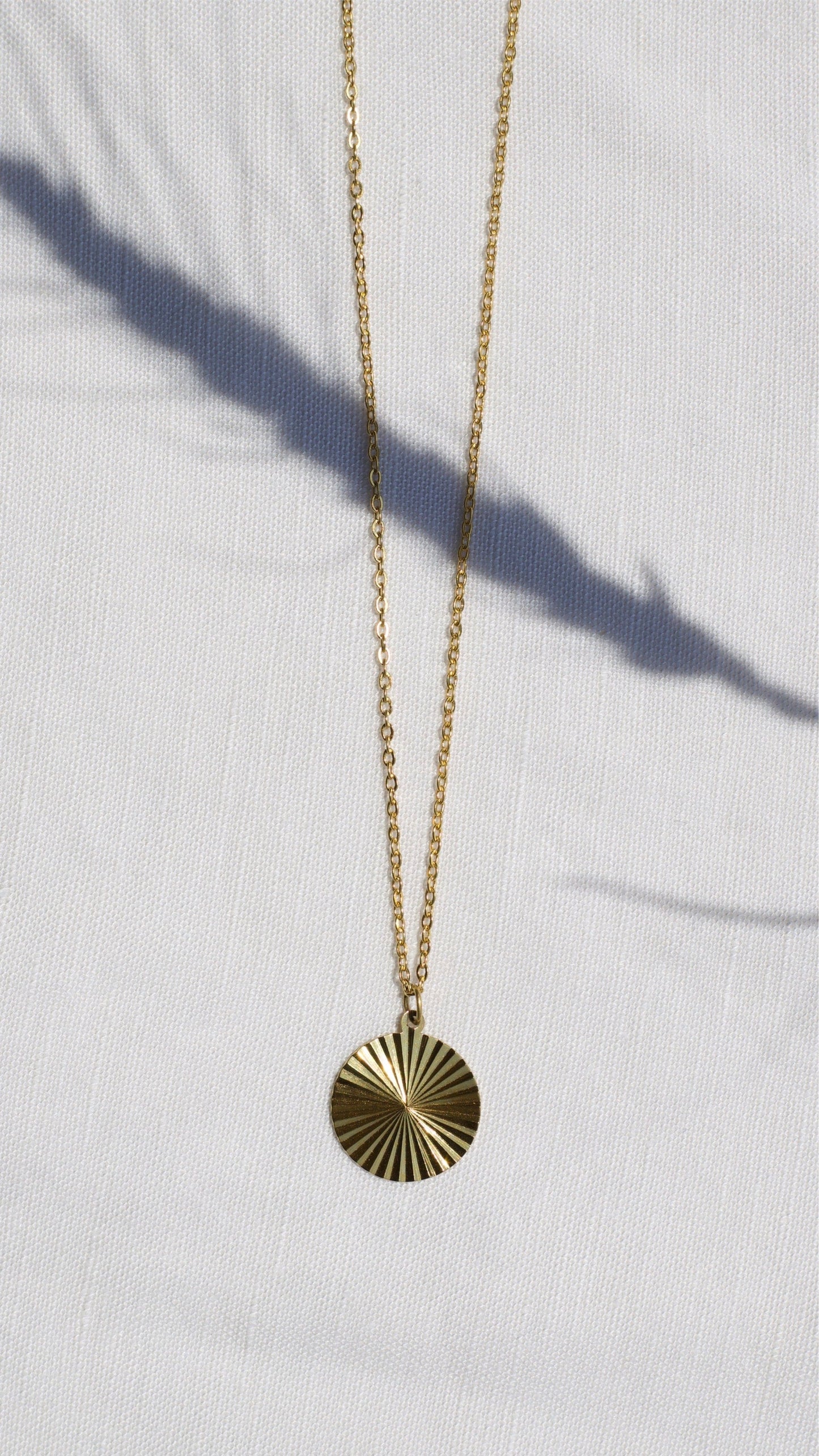 MILO SUNBURST ROUND CHARM NECKLACE